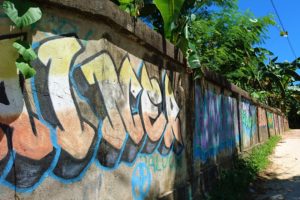 Big wall with colorful graffiti paintings in Sorong