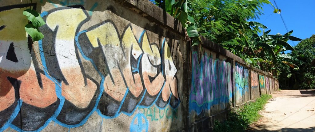 Big wall with colorful graffiti paintings in Sorong - Things to do in Sorong